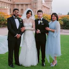 An Unseenpicture From Priyankachopra And Nickjonas Wedding Where They Are So Cutely Posin Priyanka Chopra Wedding White Wedding Gowns Hindu Wedding Ceremony