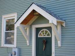 How To Build A Small Portico Above A Door Part 1 The Basic Frame Addicted 2 Decorating Door Awnings Front Door Awning Door Overhang