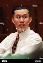 Tak Sun Tan, 21, an alleged member of the Oriental Lazyboys, a Chinatown  street gang, appears in a Los Angeles courtroom during opening statements  for the murder of Oscar-winning actor, Haing Ngor,
