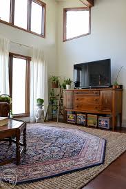 To accomplish this worldly look, find furniture that is built with several different materials. Electic Vintage Modern Living Room With Antique And Vintage Finds With Modern Colors Of Green Black And Blue 1 Refresh Living