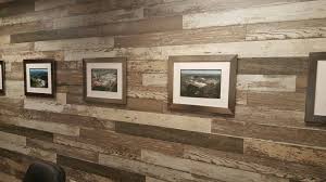 A wooden wall achieves what paint and wallpaper are seldom able to do; Laminate Flooring Looks Great On A Wall One Of The Most Popular Decorating Ideas Of The Last Ye Flooring On Walls Laminate Flooring On Walls Laminate Flooring
