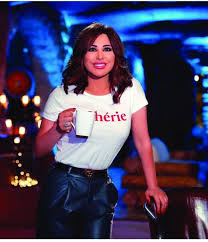 Karam has created her style which blends traditional and contemporary arabic. Ù†Ø¬ÙˆÙ‰ ÙƒØ±Ù… ØªØ«ÙŠØ± Ø§Ù„Ø¬Ø¯Ù„ Ø¨Ù€ Ø¬Ø¹ÙØ± ØªÙˆÙƒ