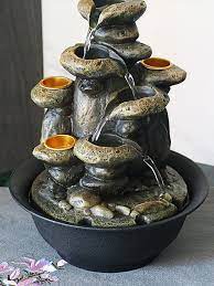 Models with bright led lights add a glowing, calming effect. Multifunction Indoor Water Fountain Candle Holders With Led Lights Three Tier Soothing Cascading Tabletop Fountains With Rocks Figurines Miniatures Aliexpress