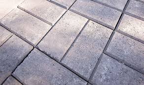 Herringbone buckling patterns of compressed thin films on compliant substrates. Reno Friendly Paving Patterns