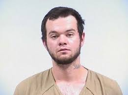 Suspect arrested in body shop shooting