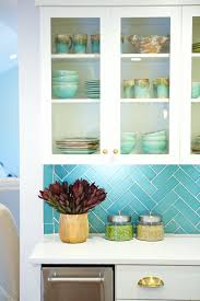 The Property Brothers Help Grandparents Finally Find Their Forever Home In 2020 Teal Kitchen Cabinets Turquoise Tile Teal Kitchen