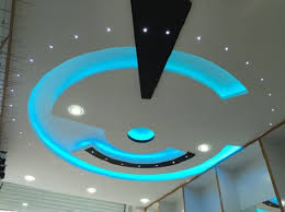 The design features a 'g' like pattern that looks futuristic. 2019 Catalogue Living Room Small House Ceiling Designs Home Architec Ideas