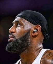 LeBron James with no father, no college education, no training, and very  few role models except his single mother Gloria, they handed this young,  dirt poor black kid $420,000 per week, at