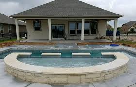 Claremont Fiberglass Inground Swimming Pool With Semi Circle Tanning Ledge And Custom Concrete Pool Deck By Aquamarine Pool Fiberglass Pools Pool Pool Builders
