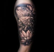 Realistic Koi Fish With Lotus Flower Mens Upper Arm Tattoos Lotus Flower Tattoo Design Tattoo Designs Men Realistic Lotus Tattoo