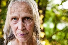Elderly Woman With Blonde Braids" by Stocksy Contributor "J Danielle Wehunt" 