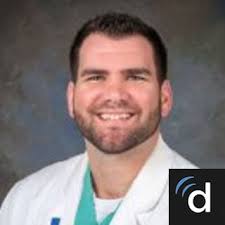 Dr. Adam E. Justice, DO