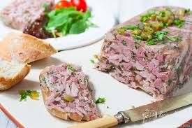 Pate in pastry is sliced and served as a starter along with a plate salad. Ham Hock Terrine Recipes Made Easy