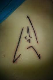 I love that it's on her foot. Pin By Andrea Jasinski On Painted Star Trek Tattoo Nerd Tattoo Star Tattoos