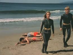 Carrying a necktie is advisable; A Woman And A Man In Vintage Rubber Wetsuits Underwater And On The Beach Youtube