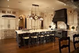 Dark brown island with white cabinets. Cream Kitchen Cabinets Warm Colors For A Cozy Atmosphere Deavita