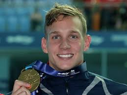 Dressel adds 3 golds at swimming worlds