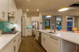 Check spelling or type a new query. White Craftsman Kitchen With Teal Glass Tile Backsplash Hgtv