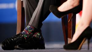 The nato socks for the nato meeting, one blue and one pink: Stepping Out In Style Justin Trudeau S Colourful Sock Wardrobe The Globe And Mail