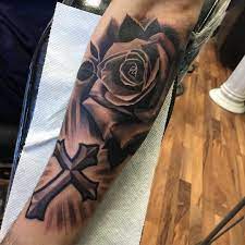 Cross with flowers tattoo men. Pin On Men S Fashion