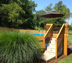 If you're installing a permanent above ground pool but don't want the appearance of a random structure in your yard, there are many if you don't have the time, money, or even the desire to build a deck entirely around your pool, consider building a small partial deck on just one side with a staircase. 21 The Ultimate Guide To Above Ground Pool Ideas With Picture