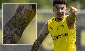 Tattoos are among humanity's most ubiquitous art forms. Jadon Sancho Shows His Love For The Simpsons As Dortmund Star Gets Cartoon Family Inked On His Arm Daily Mail Online