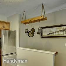 You Can Store Your Pots And Pans Neatly With This Ceiling Mounted Diy Organizer Pan Organization Diy Kitchen Projects Simple Storage