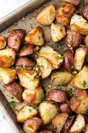 Garlic Roasted Potatoes With Rosemary Jessica Gavin Recipe Garlic Roasted Potatoes Roasted Potatoes Roasted Potato Recipes