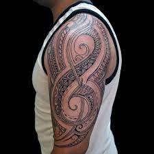 If you are a music loving person then go for a tribal guitar tattoo which will define your endless love for music. 75 Music Note Tattoos For Men Auditory Ink Design Ideas Half Sleeve Tattoos For Guys Music Tattoo Sleeves Music Tattoo Designs