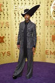 In a red carpet interview with e!'s ryan seacrest, porter said that his suit is a standing outfit. How Billy Porter S Style Has Evolved Over The Years