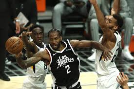 The clippers' kawhi leonard is in pain as teammate paul george checks on him during game 4 against the jazz. M7h7a8rq3mjfwm