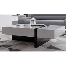 It can be used as a coffee table or as a side table. Amazon Com Mcintosh High Gloss Coffee Table With Storage White Black Rectangle Furniture Decor
