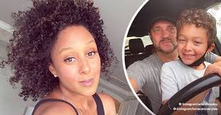 See Tamera Mowry's Husband Adam Teach Their 7-Year-Old Son Aden to Drive in  a Recent Photo