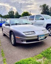 Image result for Black Gold 1995 Saturn