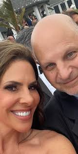 All I can see are teeth. Fessler and hubby at a family wedding.  #margaretjosephs #jennfessler #MelissaGorga #TeresaGiudice #rachelfuda  #dolorescatania #jenniferaydin #daniellecabral #jackiegoldschneider #RHONJ  #bravotv #giagiuduce #andycohen ...