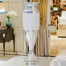 Whether you have a formal living room, a family room, or den, you'll find inspiring photos of living rooms, tricks for small living rooms, and living room paint color ideas from experts. Buy Large European Creative Resin Floor Vase Modern Minimalist Living Room Decorations Ornaments Hotel Clubs Villa In Cheap Price On M Alibaba Com