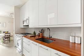 Stained kitchen cabinets with painted island. Ikea Kitchen Cabinets Everything Renovators Need To Know Sweeten Com