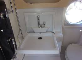 400 fold down sink not draining well