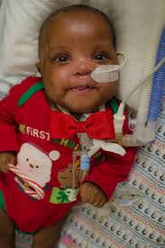 Santa made an early visit to our NICU to visit these sweet bundles of joy.  #BabysFirstChristmas #NICUChristmas #PreciousMoments #CHKD