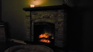 The mantel is finished in stacked faux stone, with a coffee oak top, base and decorative trim. Allen Roth Stone Electric Fireplace From Lowe S Youtube