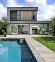 Maison Contemporaine En Ossature Bois A Caluire Et Cuire L Extension A Des Grandes Baies Vitrees Qui Modele Maison Modele Maison Moderne Maison Contemporaine