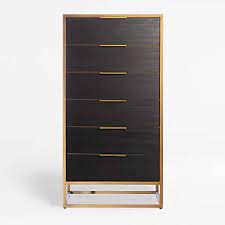 A short dresser in the bedroom makes room for folded clothes while keeping a low profile beneath a window or to accommodate a wall mirror. Tall Dressers Crate And Barrel