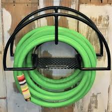 Hose Jockey Wall Mount In 2020 Garden Hose Holder Hose Holder Hose Hanger