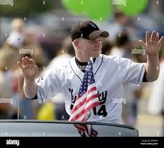 Aaron Alvey waves to the crowds gathered along the parade route for his  Little League World Series teammates Monday, Sept. 2, 2002 in Louisville,  Ky. Alvey, 12, was the winning pitcher as