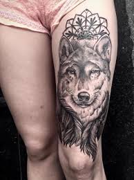 Uroda twarz & ciało kobiece tatuaże damskie tatuaże tatuaż podwiązka tatuaż na nodze. Tatuaz Wilk Udo Przez Art Faktors