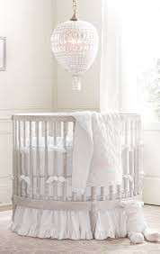 With round crib for the baby, there'll be no sharp edges, and the baby can be easily monitored. Full Circle Round Cribs Nestle Into Small Spaces With Ease Their Unique Silhouettes Transform Any Nook Into A Nurser Round Cribs Baby Crib Diy Baby Girl Room