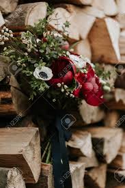 Here's a selection of bridal bouquet ideas, pictures, unique wedding bouquets and floral arrangements for the modern bride. Beautiful Bohemian Wedding Bouquet With Red Peonies And White Stock Photo Picture And Royalty Free Image Image 85456668