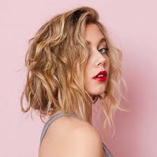 Three bun rings are pinned together and placed on the crown of the head. Feel Look Vintage With These 50 Superb Hairstyles Hair Motive Hair Motive