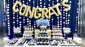 Enjoy the gift of making the graduate feel special. Graduation Party Desserts Blue White Gold Graduation Buffet Table Graduation Party Desserts Gold Graduation Party Graduation Party Centerpieces