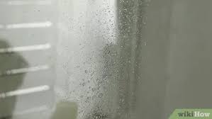 How to clean hard water stains and spots on shower glass. 3 Ways To Remove Hard Water Stains From Glass Wikihow